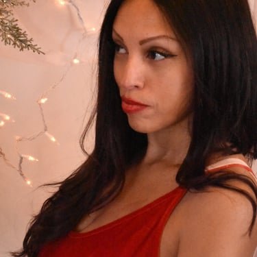 Ruth Marie in a red dress with flowers